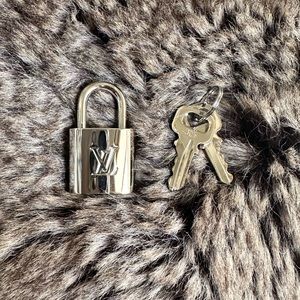 RARE Louis Vuitton silver lock and 2 keys